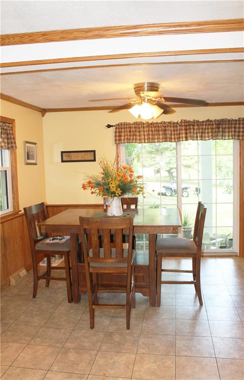 183 Concord Circle Road Beaver Falls, PA 15010 - Photo 8 of 25 Sliding glass doors lead from the kitchen to the covered patio...