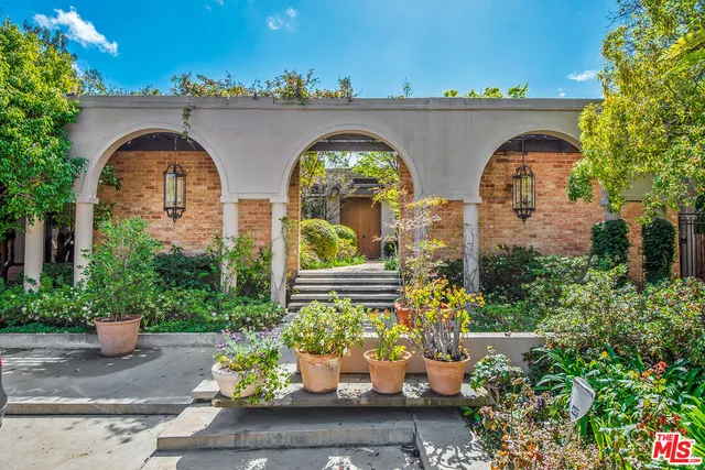 a front view of house with outdoor space