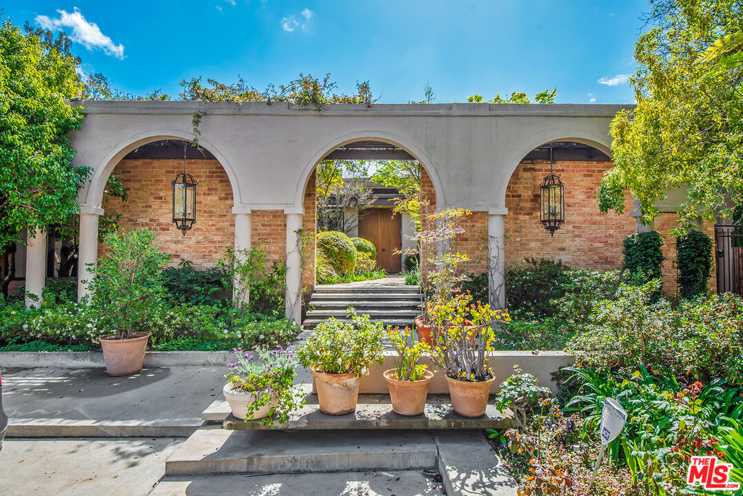 a front view of house with outdoor space