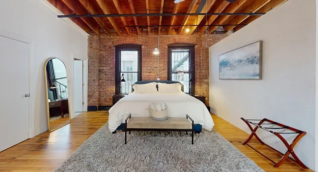 a view of livingroom with furniture and window