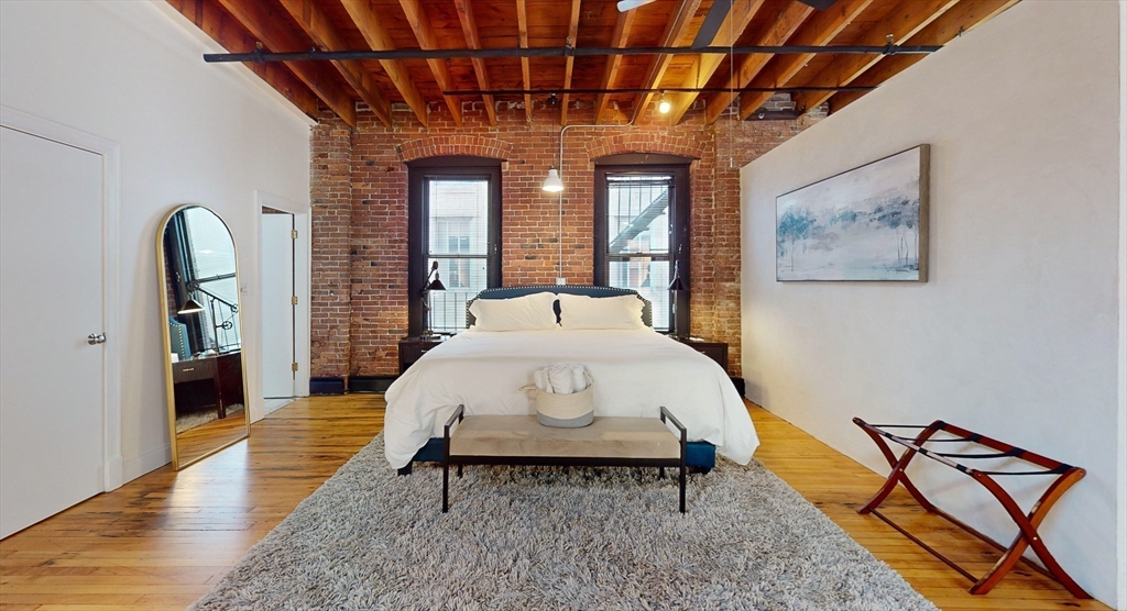 19 Stanhope Street, Unit 3A Boston, MA 02116 - Photo 11 of 19 a view of livingroom with furniture and window