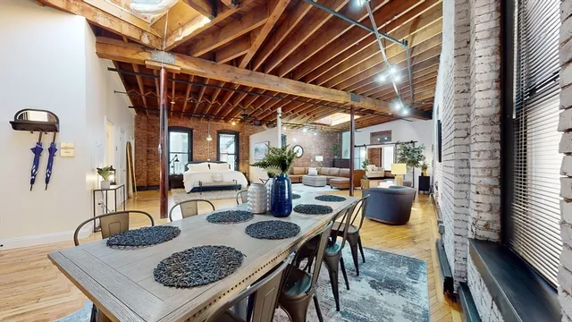 a view of a dining room with furniture