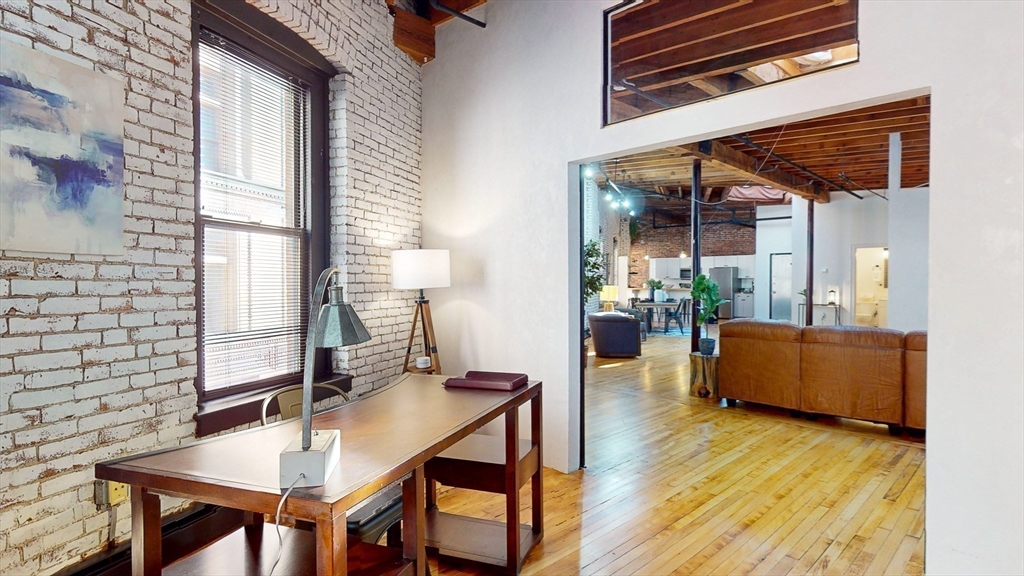 19 Stanhope Street, Unit 3A Boston, MA 02116 - Photo 8 of 19 a dining room with furniture and wooden floor