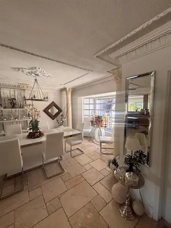 a living room filled with furniture