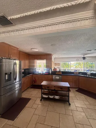 a kitchen with granite countertop lots of counter top space
