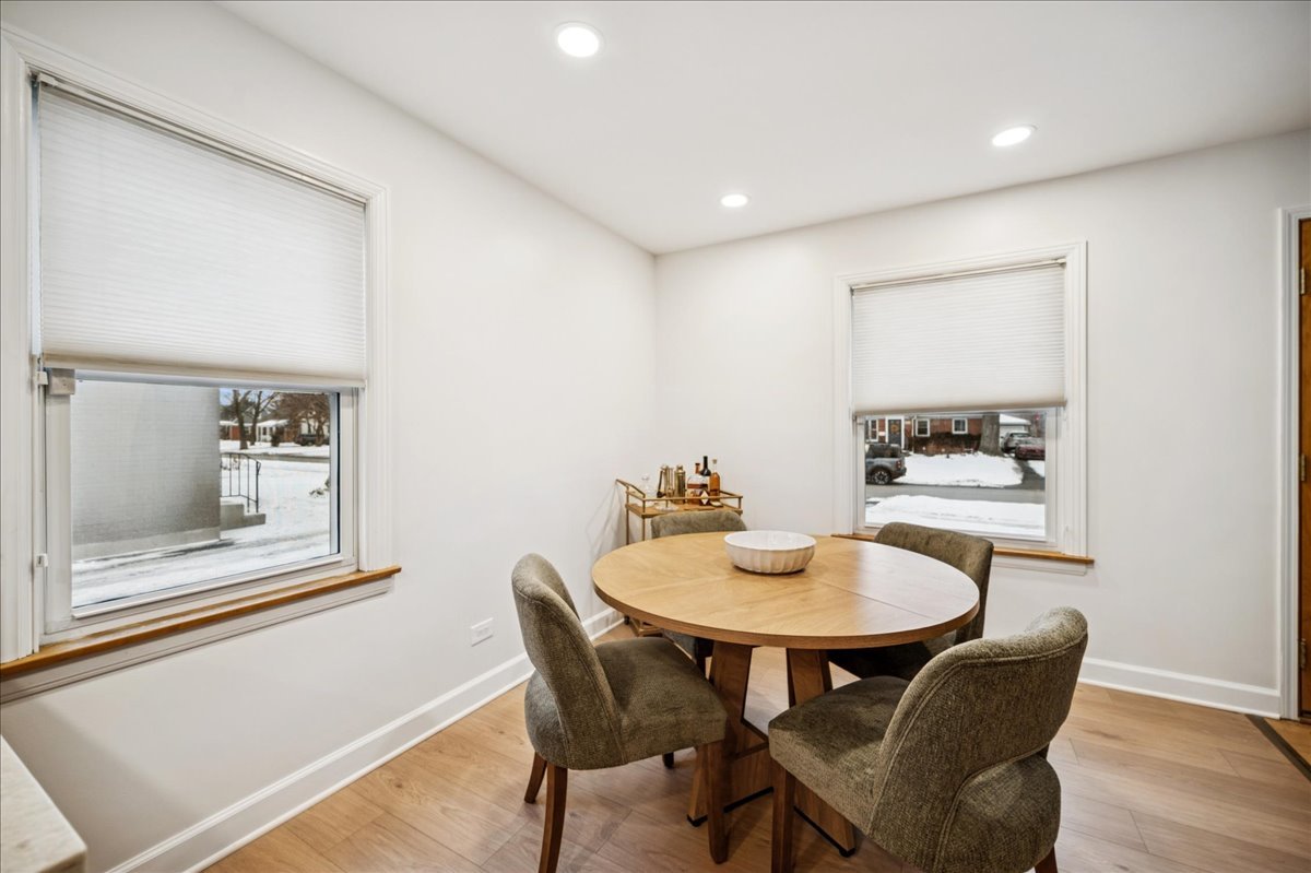 453 Longfellow Avenue Deerfield, IL 60015 - Photo 9 of 25 a view of a dining room with furniture and wooden floor