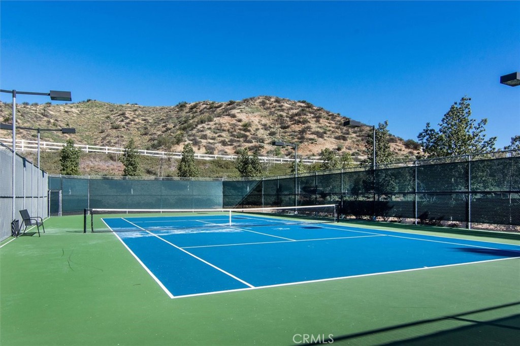 29370 Las Brisas Road Valencia, CA 91354 - Photo 53 of 57 “Enjoy the Tesoro de Valle Community Amenities” because it works for the pool, clubhouse, tennis, pickleball, parks, and other HOA photos.