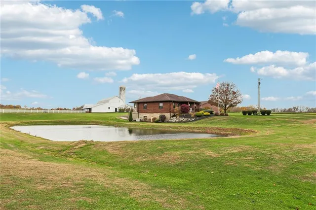 a view of a house with a big yard