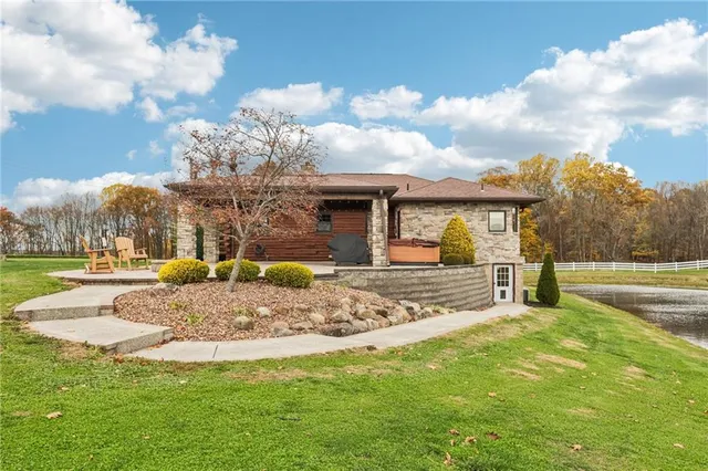 a view of a lake with houses in the background