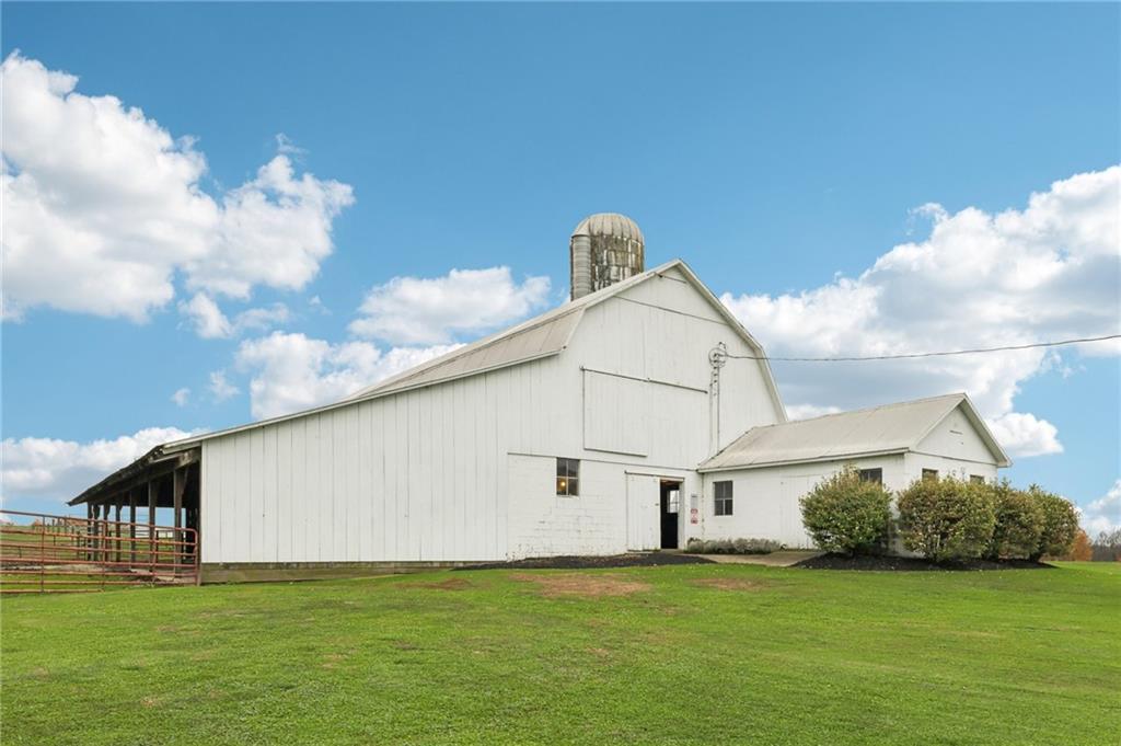 718 McDowell Road Volant, PA 16156 - Photo 28 of 34 a view of a house with backyard