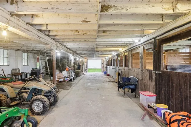 a view of a backyard with pathway