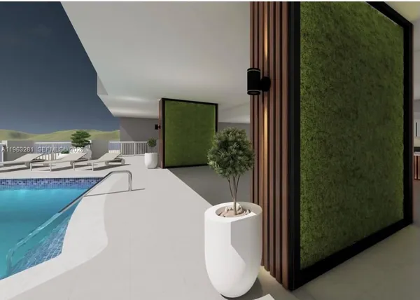 a dining room with furniture and a rug