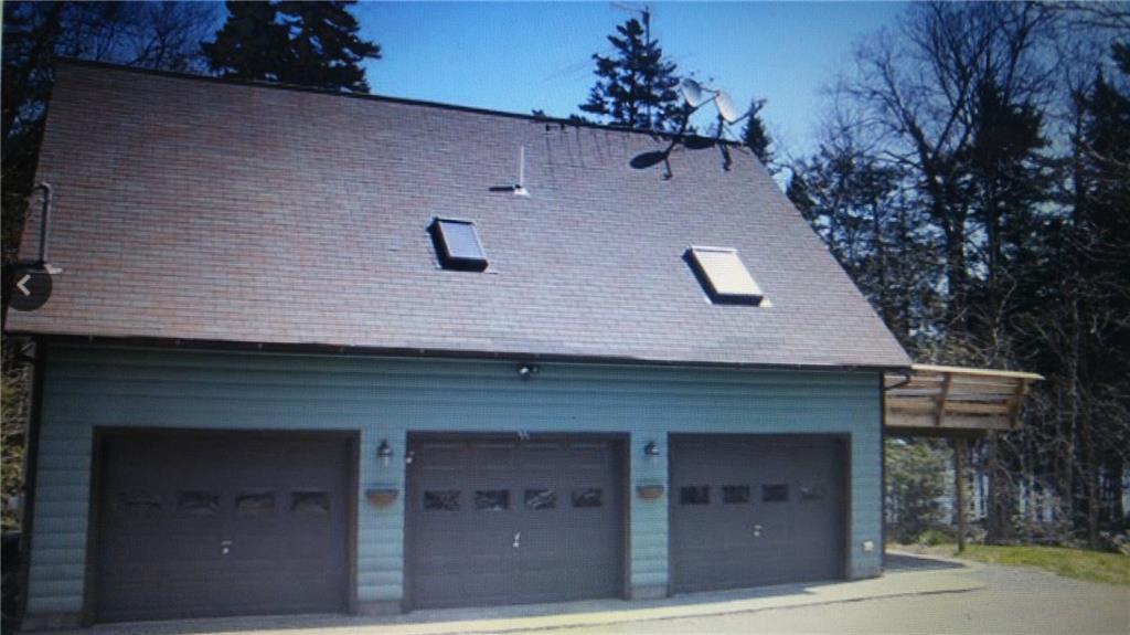 55 Wilson Pond Road Greenville, ME 04441 - Photo 2 of 24 Heated 3 bay garage