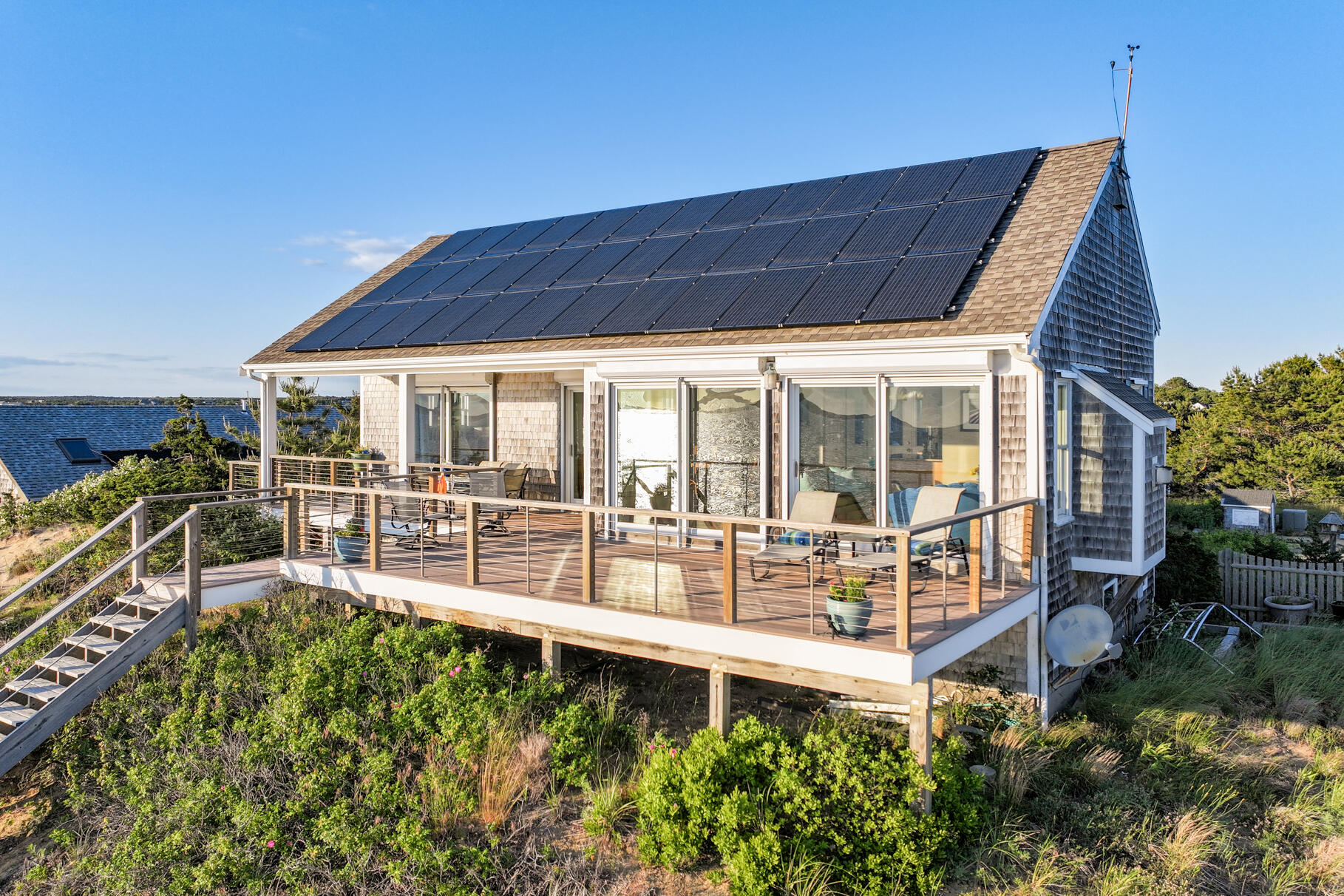 114 4th Street Wellfleet, MA 02667 - Photo 16 of 16 front view of a house with a large window