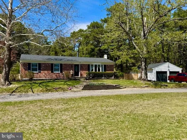 a view of house with outdoor space and swimming pool