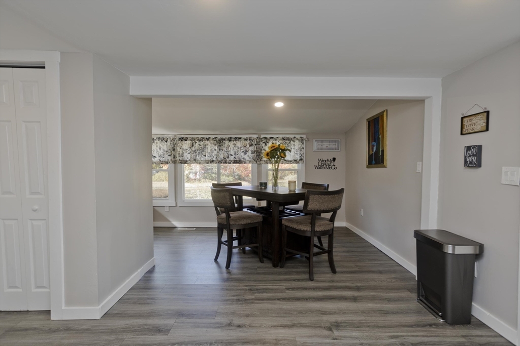 87 Pequot Point Road Westfield, MA 01085 - Photo 19 of 42 a view of a dining room with furniture and wooden floor