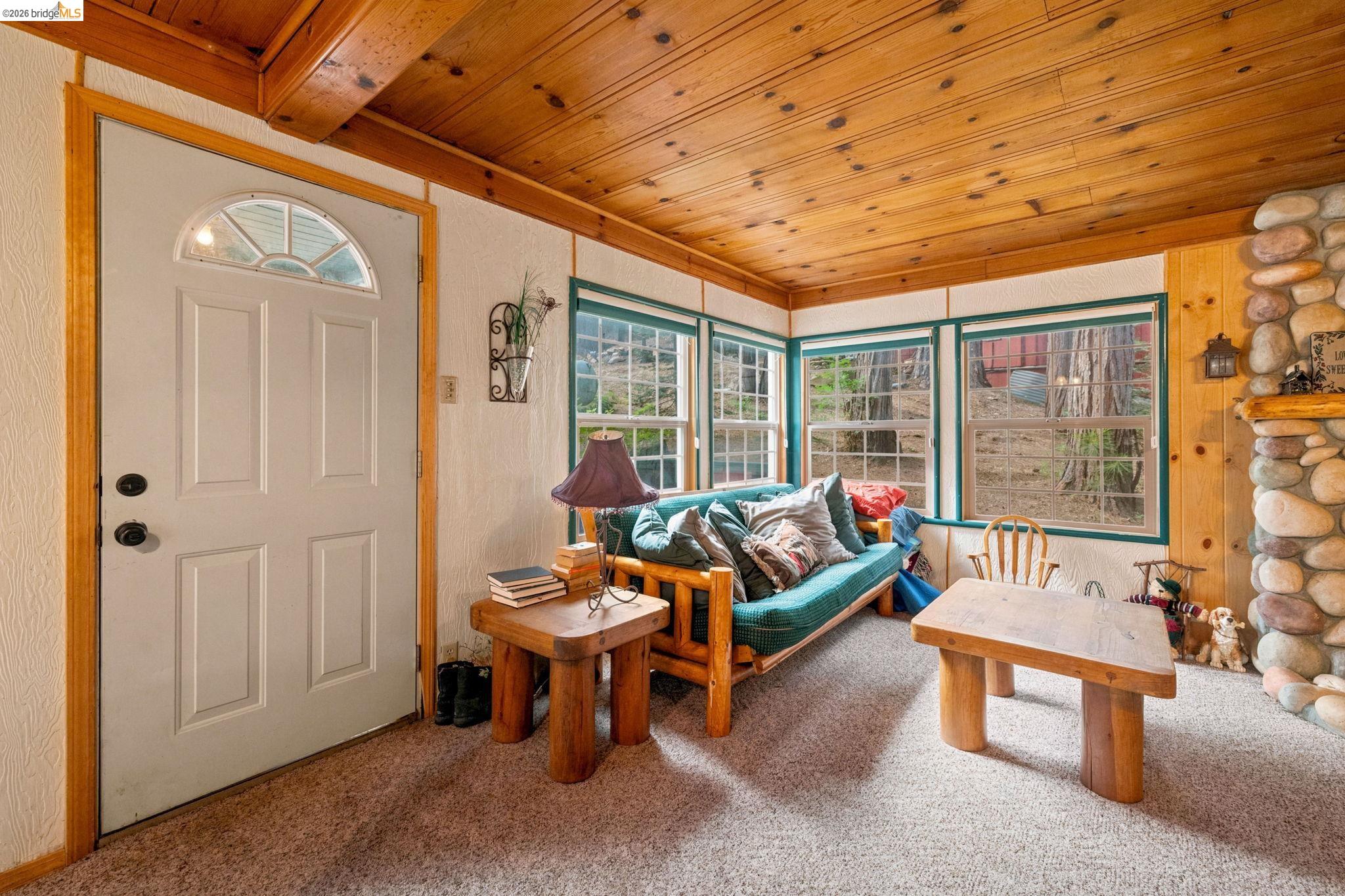 25822 Long Barn Sugar Pine Road Long Barn, CA 95335 - Photo 5 of 28 a living room with furniture and a window