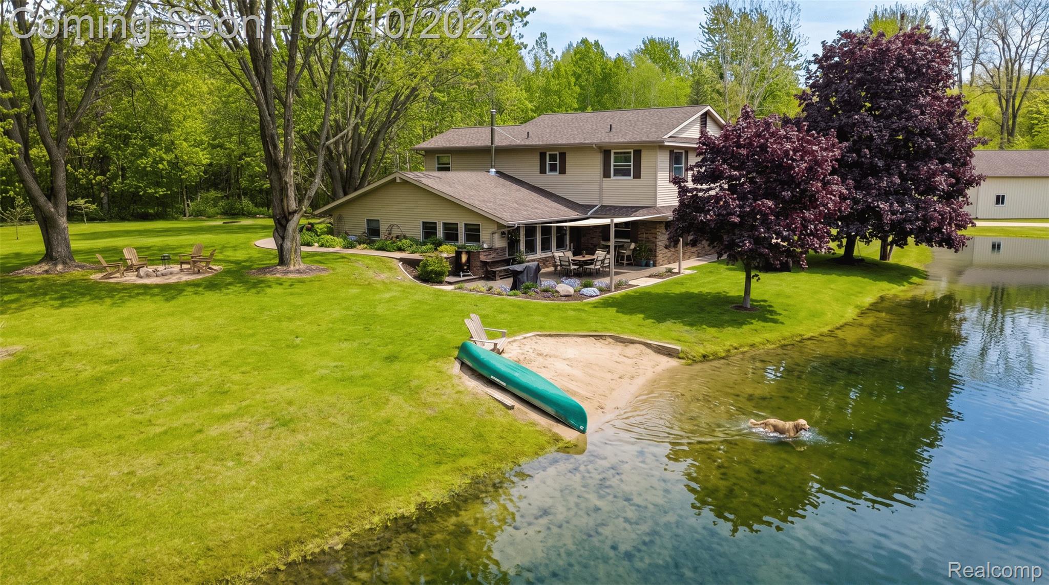 5278 Skelton Road Columbiaville, MI 48421 - Photo 63 of 64 Expansive waterfront property featuring a private beach area, direct lake access, and a spacious lawn