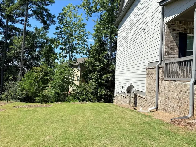 a view of backyard and entertaining space