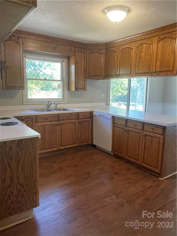 2575 Briggs Road Salisbury, NC 28147 - Photo 3 of 13 a kitchen with sink cabinets and wooden floor