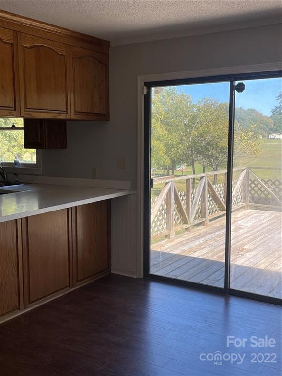 2575 Briggs Road Salisbury, NC 28147 - Photo 5 of 13 a view of a kitchen with wooden floor and a window