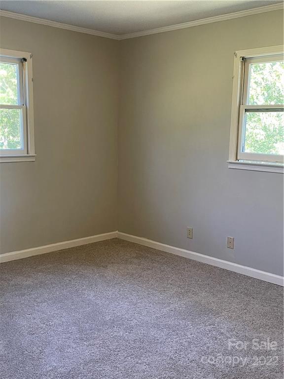 2575 Briggs Road Salisbury, NC 28147 - Photo 7 of 13 an empty room with a window