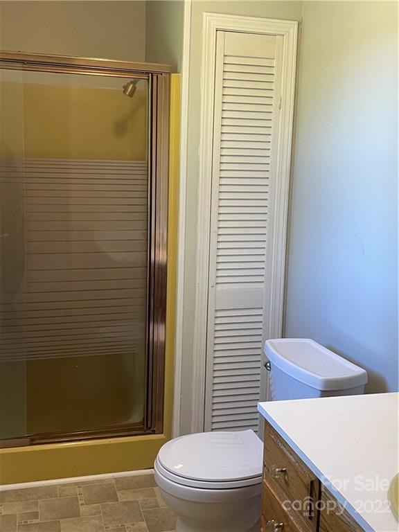 2575 Briggs Road Salisbury, NC 28147 - Photo 8 of 13 a bathroom with a toilet a sink and shower