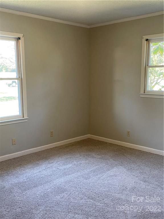2575 Briggs Road Salisbury, NC 28147 - Photo 9 of 13 an empty room with a window