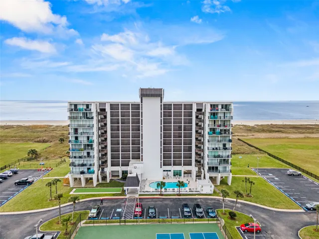 a view of a balcony with ocean view