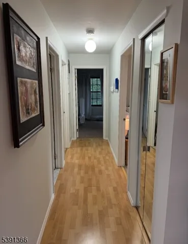 a spacious bathroom with a double vanity sink mirror and toilet