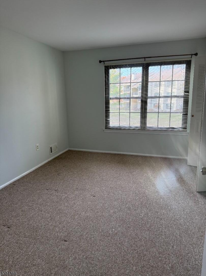 122 Irving Place Bernards, NJ 07920 - Photo 17 of 20 an empty room with a windows