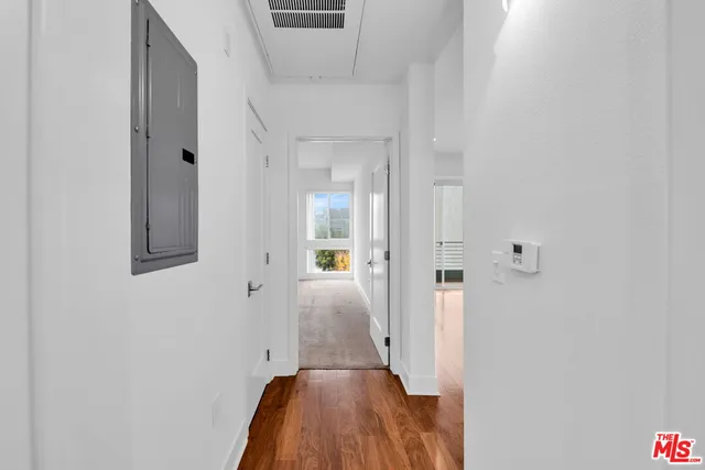 a bathroom with a shower a toilet and a sink