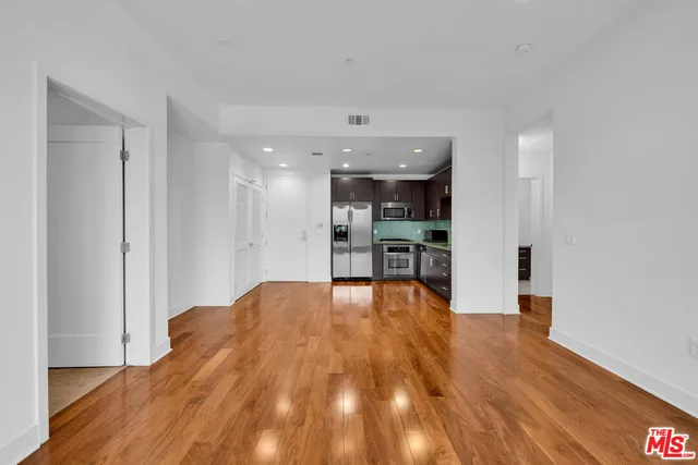 a view of kitchen with wooden floor