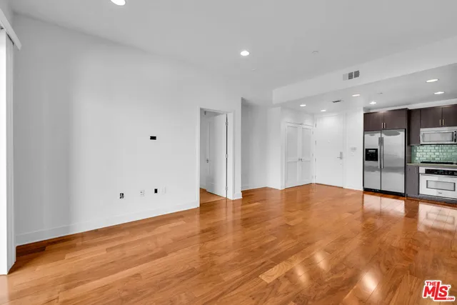 a utility room with sink dryer and washer