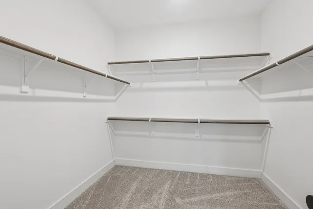 a view of an empty walk in closet