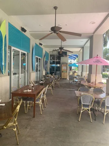 a dining space with furniture and outdoor view