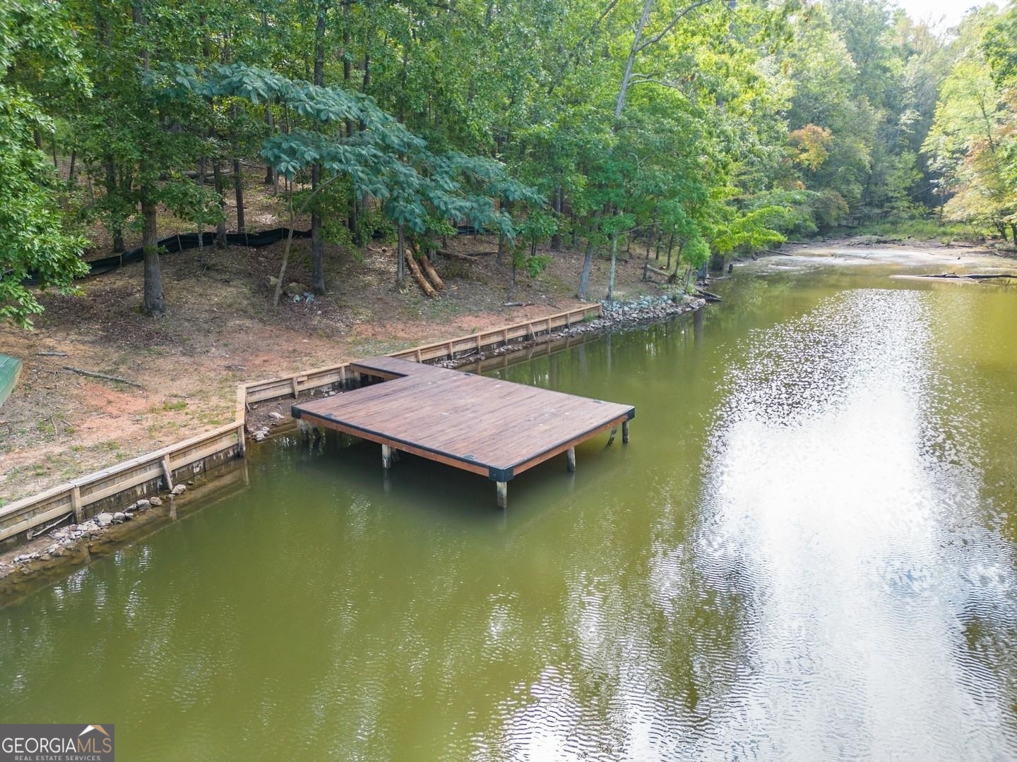 0 Summit View Road Jackson, GA 30233 - Photo 17 of 23 a view of a lake with a large trees