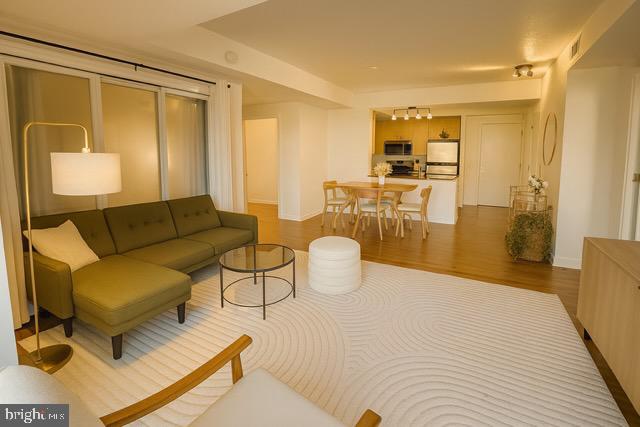 a living room with furniture and a table