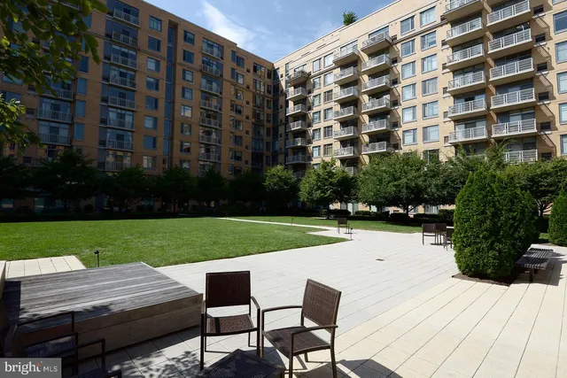 a view of a sitting area in front of a building