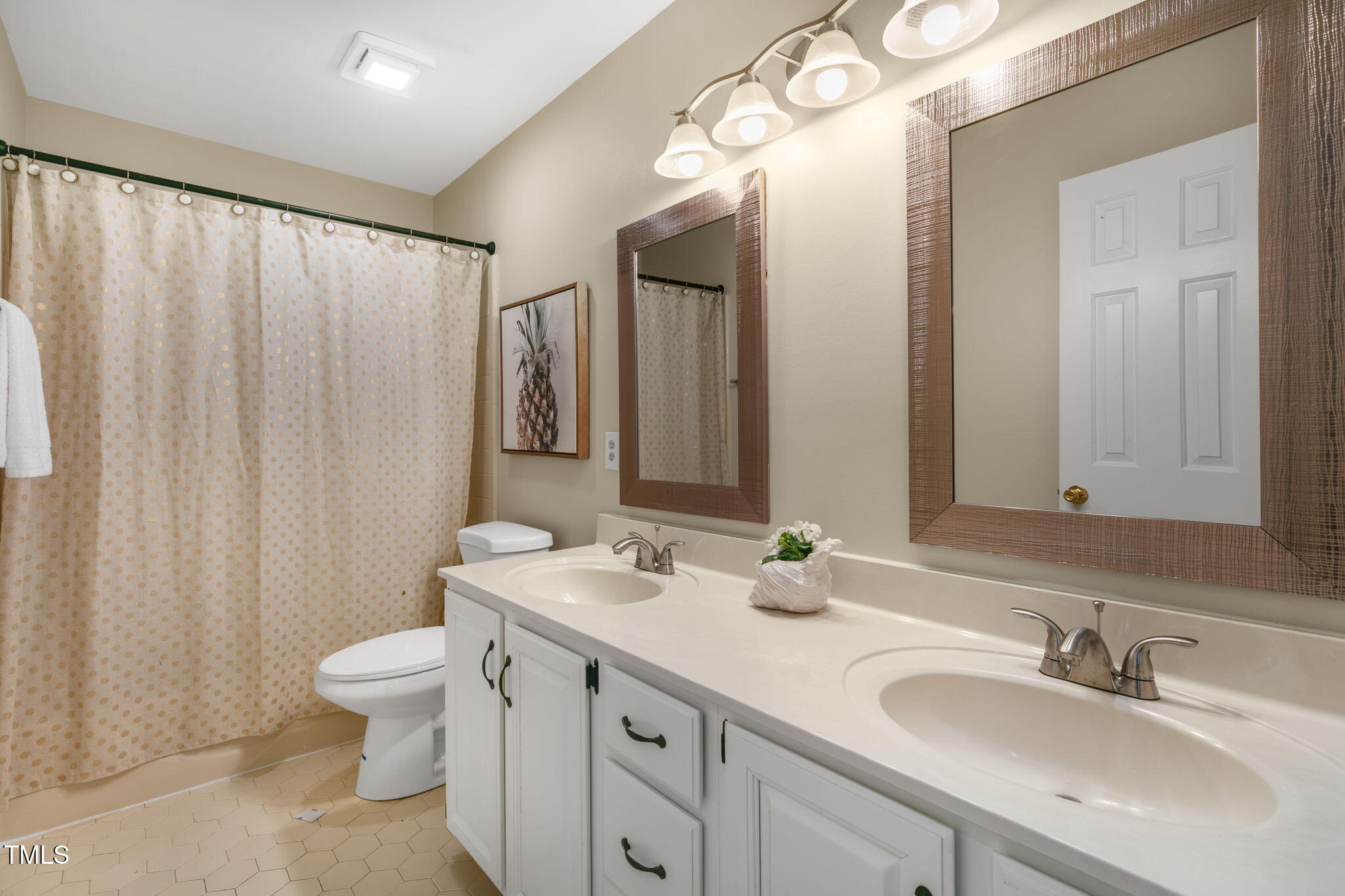6205 Trevor Court Raleigh, NC 27613 - Photo 35 of 42 Double sinks upstairs shared bathroom
