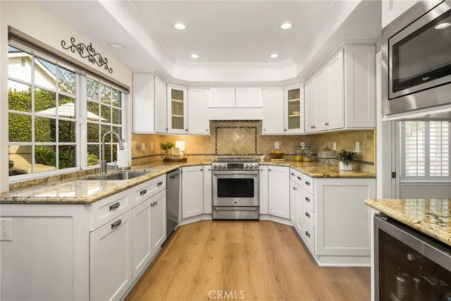 a view of a backyard with sitting area