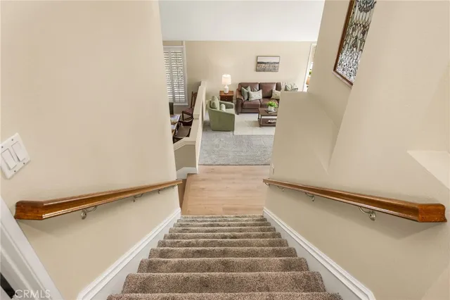 an aerial view of multiple houses with yard