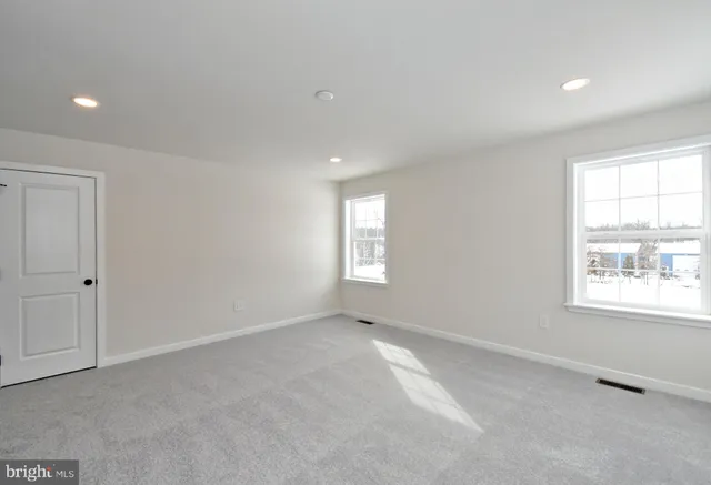 a view of an empty walk in closet