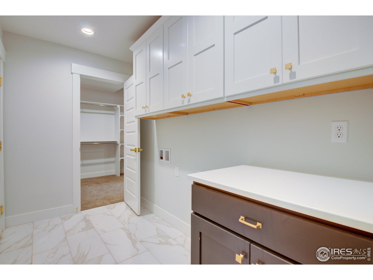 5701 2nd Road Greeley, CO 80634 - Photo 17 of 26 And a quick escape door to the laundry room for convenience