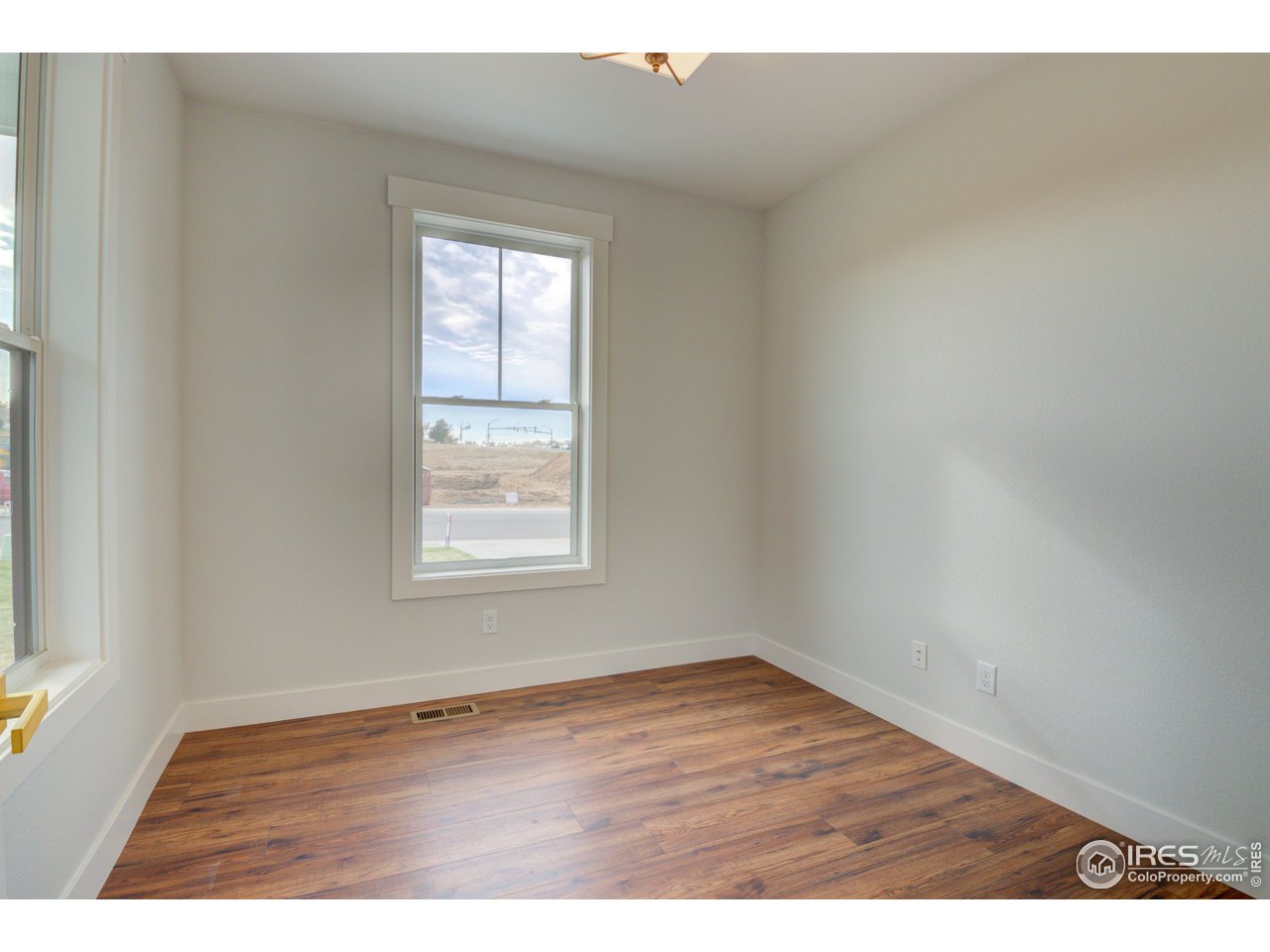 5701 2nd Road Greeley, CO 80634 - Photo 3 of 26 An office space near the front of the home adds versatility