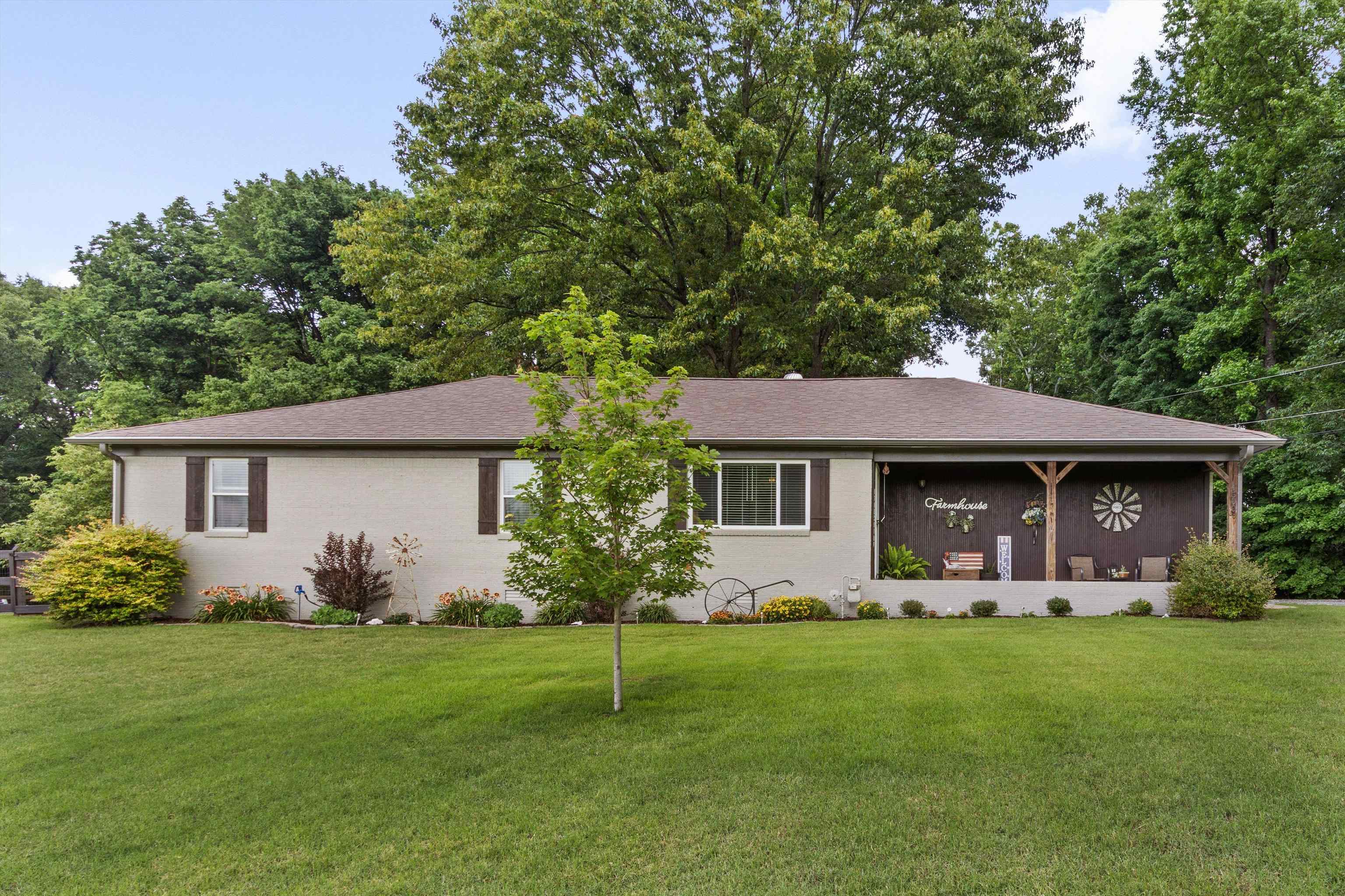 4500 Drummonds Road Drummonds, TN 38023 - Photo 2 of 29 a front view of house with yard and green space
