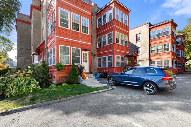 a car parked in front of a building