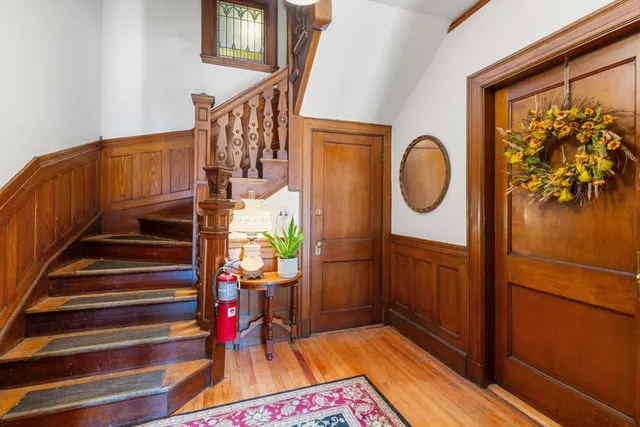 a view of entryway with wooden floor