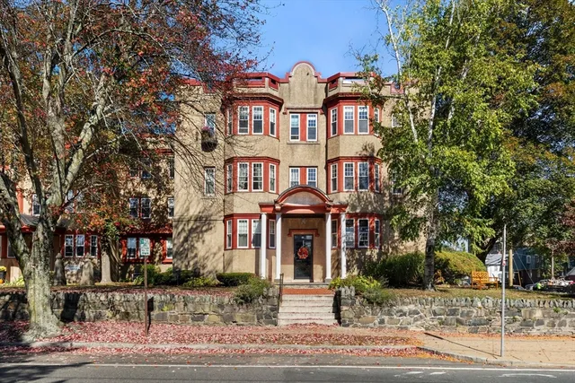a view of a brick building with a outdoor space