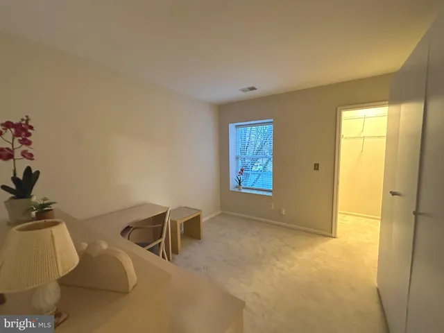 a view of livingroom with furniture and windows